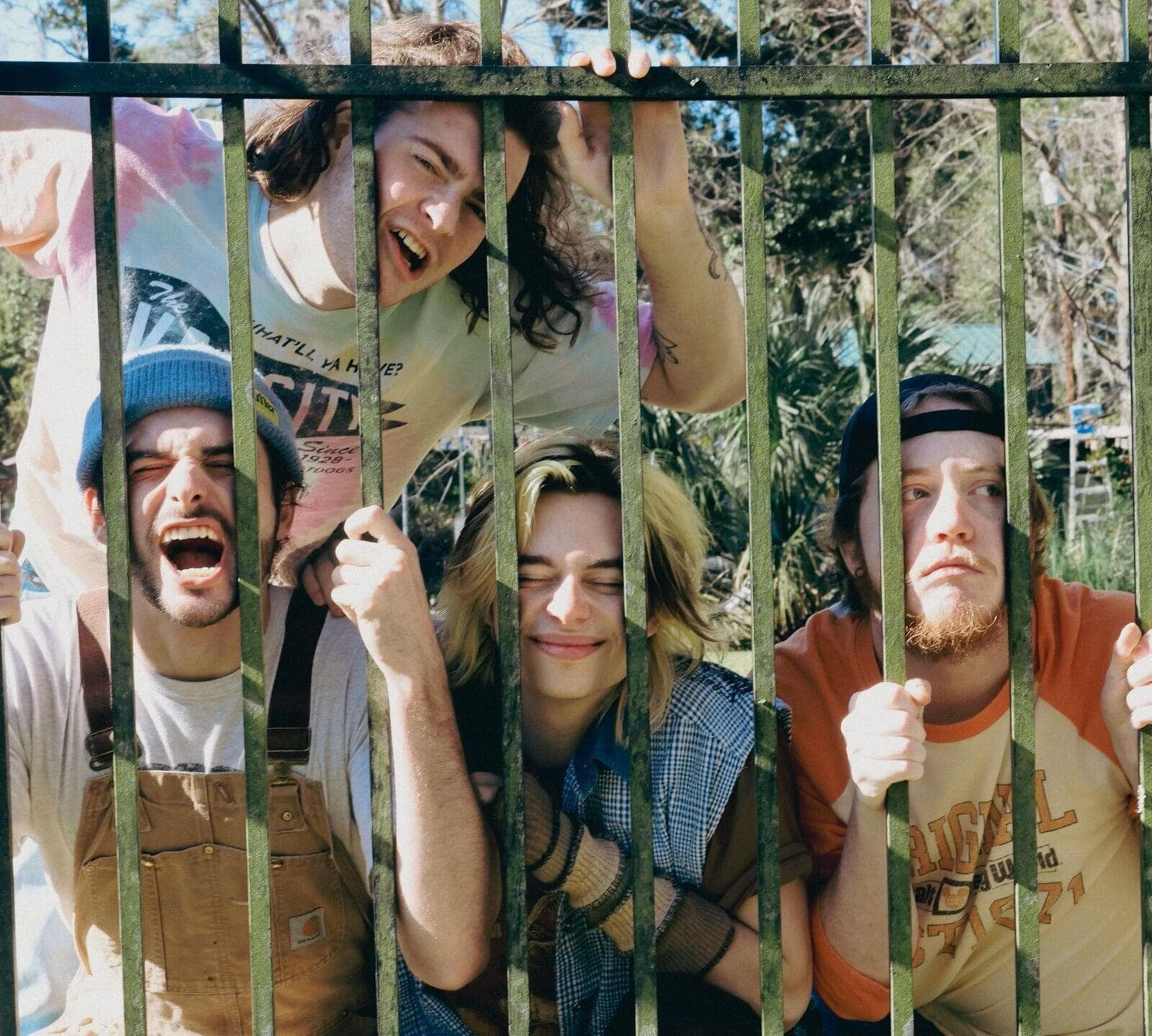Birdleaf band image four members behind bars goofy faces